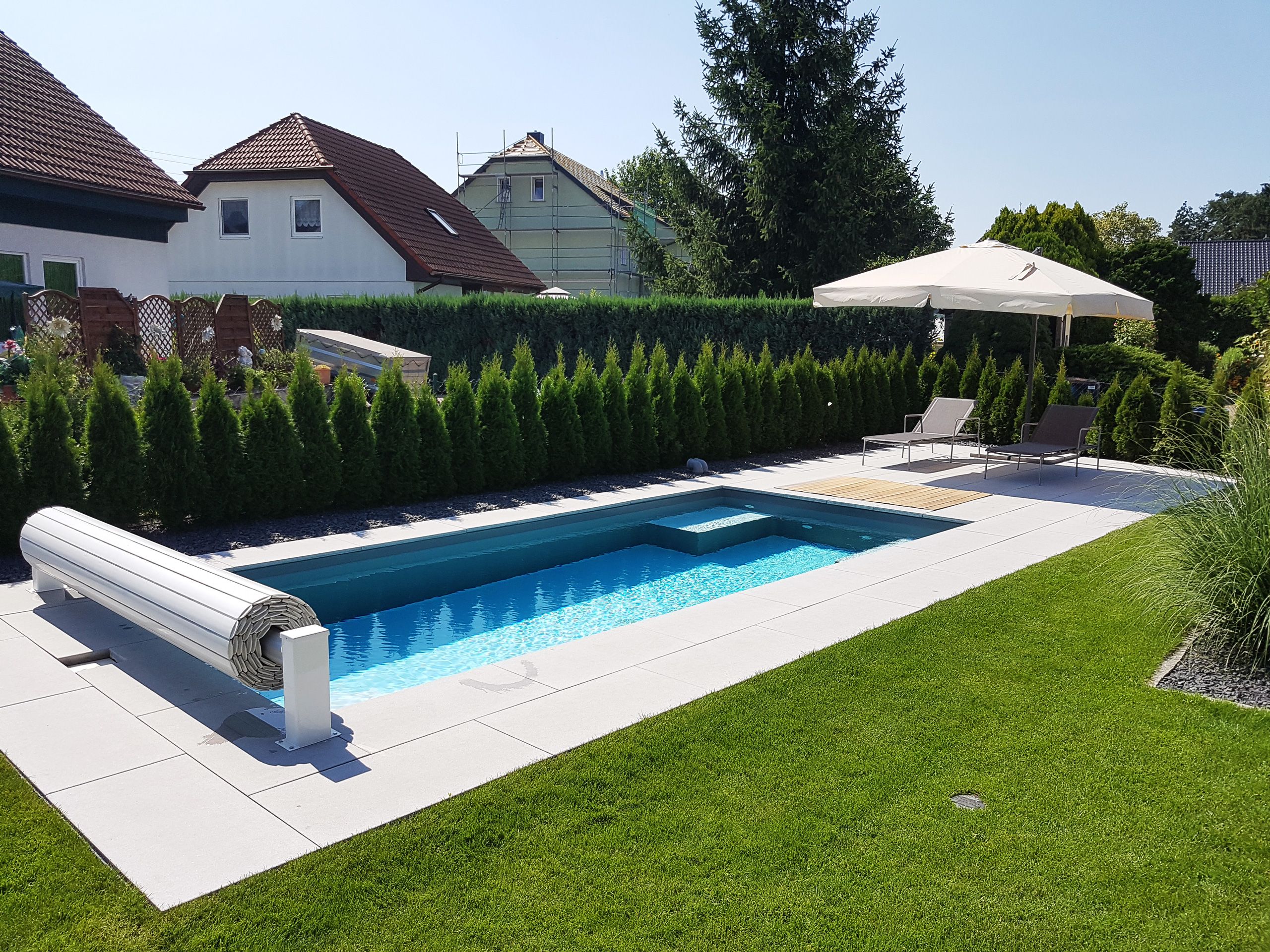 Pool 2,85x6,5x1,5m mit Treppe, Podest und Rollladenabdeckung